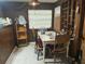Eat-in kitchen and dining area featuring a small table with natural light from the window at 5807 N Hale Ave, Tampa, FL 33614