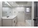 Stylish bathroom equipped with a modern vanity and tub, offering a tranquil retreat with contemporary amenities and soothing ambiance at 6123 India Dr, Spring Hill, FL 34608