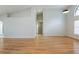Expansive living room with hardwood floors and high ceilings, perfect for entertaining at 6123 India Dr, Spring Hill, FL 34608