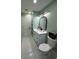 Stylish bathroom featuring modern fixtures, a marble countertop, and a well-lit mirror at 6332 Emerson S Ave, St Petersburg, FL 33707