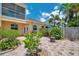 Serene backyard featuring a patio, a manicured garden, and privacy fencing at 6400 46Th N Ave # 61, Kenneth City, FL 33709