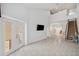 Open foyer with high ceilings, tile floors, and a stair lift at 6400 46Th N Ave # 61, Kenneth City, FL 33709