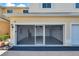Spacious garage featuring a screened-in door and ample storage space at 6400 46Th N Ave # 61, Kenneth City, FL 33709
