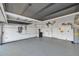 Well-organized garage with shelving, a ceiling fan, and a water heater at 6400 46Th N Ave # 61, Kenneth City, FL 33709