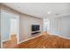Hallway featuring wood-look floors, neutral walls and easy access to various rooms at 6400 46Th N Ave # 61, Kenneth City, FL 33709
