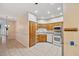 Open-concept kitchen with natural light, oak cabinetry, and sleek appliances for modern convenience at 6400 46Th N Ave # 61, Kenneth City, FL 33709