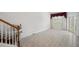 Open living room area with stair lift and tile flooring at 6400 46Th N Ave # 61, Kenneth City, FL 33709