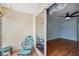 Enclosed patio featuring a chair and access to the room via a sliding glass door at 6400 46Th N Ave # 61, Kenneth City, FL 33709