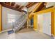 Basement stairs lead to the first floor with a downstairs bathroom and access to the garage at 6543 Louise Ct, Hudson, FL 34667