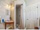 Unique bathroom featuring stylish sink and shower, offering a cozy retreat at 6543 Louise Ct, Hudson, FL 34667