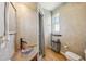 Unique bathroom featuring vanity sink, walk-in shower, and decorative walls at 6543 Louise Ct, Hudson, FL 34667