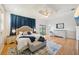 Bright bedroom with elegant decor and an access door to an outdoor balcony or patio at 6543 Louise Ct, Hudson, FL 34667