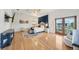 Spacious main bedroom with a ceiling fan, a balcony, and a glimpse of the waterway at 6543 Louise Ct, Hudson, FL 34667