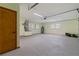 Spacious garage with work area, bright lighting and lots of room for storage and projects at 6921 N 16Th St, Tampa, FL 33610