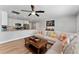 Inviting living room flows into the kitchen, creating a welcoming open space for entertaining at 7210 14Th N St, St Petersburg, FL 33702