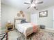 Comfortable bedroom with soft decor, and stylish rug at 7211 Red Oak Loop, New Port Richey, FL 34654