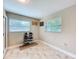 Bonus room with natural light and adjacent closet at 7211 Red Oak Loop, New Port Richey, FL 34654