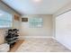 Spacious bonus room with tile flooring and closet at 7211 Red Oak Loop, New Port Richey, FL 34654