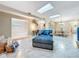 Bright, open-concept living space with skylights and stylish decor at 7211 Red Oak Loop, New Port Richey, FL 34654