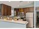 Well-equipped kitchen with stainless steel appliances, modern cabinets, and decorative backsplash at 9107 Brunswick Ln, Tampa, FL 33615