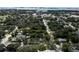 Panoramic aerial view of a residential neighborhood with mature trees and city skyline at 921 Grand Central St, Clearwater, FL 33756