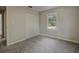 Neutral bedroom with a large closet and a bright window letting in plenty of natural light at 921 Grand Central St, Clearwater, FL 33756