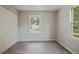 A light bedroom featuring a closet, a window, and neutral colors at 921 Grand Central St, Clearwater, FL 33756