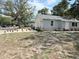 Charming single-story home with a newly landscaped front yard and neutral exterior paint at 921 Grand Central St, Clearwater, FL 33756