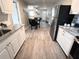 Bright kitchen featuring stainless steel appliances and views of the adjacent dining area at 921 Grand Central St, Clearwater, FL 33756