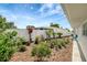 Well-maintained backyard featuring privacy fence, tropical landscape and garden at 9619 Towanda Ln, Port Richey, FL 34668