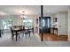 Formal dining room with chandelier, large mirror, and front door at 9619 Towanda Ln, Port Richey, FL 34668