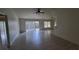 Bright living room featuring tile flooring and sliding glass doors to the backyard at 10024 Cedar Dune Dr, Tampa, FL 33624