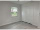 Bright bedroom featuring a closet, and neutral walls at 1005 S Empire St, Plant City, FL 33563