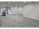 Spacious living room with recessed lighting, light gray flooring, and neutral walls at 1005 S Empire St, Plant City, FL 33563