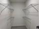 Walk-in closet featuring wire shelving and neutral gray walls at 1005 S Empire St, Plant City, FL 33563
