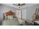 Comfortable bedroom featuring a wood ceiling fan and soothing color palette at 1010 E Fern St, Tampa, FL 33604