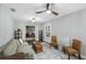 Comfortable living room featuring a sofa, stylish decor, wood look floors, and plenty of natural light at 1010 E Fern St, Tampa, FL 33604