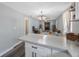 Open floor plan offers seamless living and dining space, with a view into the kitchen at 1010 E Fern St, Tampa, FL 33604
