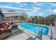 Enjoy the outdoors year-round in this screened pool, perfect for relaxation and recreation at 1010 E Fern St, Tampa, FL 33604