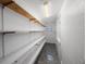 Well-lit storage room featuring multiple shelves for ample storage space at 1010 E Fern St, Tampa, FL 33604