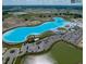 Beautiful community featuring a large lagoon, clubhouse, and ample parking at 10747 Laxer Cay Loop, San Antonio, FL 33576