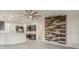 Open concept living space combining kitchen, living, and dining areas, complete with tile floors at 10915 Kirkwall Port Dr, Wimauma, FL 33598