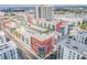 An aerial view highlights a modern community with pools, amenities, and city views at 1120 E Kennedy Blvd # 912, Tampa, FL 33602