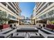 Inviting courtyard with modern lounge seating and lush landscaping for relaxation and socializing at 1120 E Kennedy Blvd # 912, Tampa, FL 33602