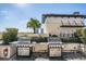 Outdoor grilling area with stainless steel gas grills and lush landscaping, ideal for hosting gatherings and enjoying outdoor cooking at 1120 E Kennedy Blvd # 912, Tampa, FL 33602