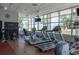 Modern gym with treadmills, weights, and large windows offering natural light, creating an invigorating workout environment at 1120 E Kennedy Blvd # 912, Tampa, FL 33602