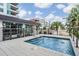 Tranquil hot tub area with modern railings and tropical landscaping, providing a serene and luxurious amenity at 1120 E Kennedy Blvd # 912, Tampa, FL 33602