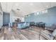 A modern resident lounge area features a kitchenette, seating and tables for a comfortable gathering space at 1120 E Kennedy Blvd # 912, Tampa, FL 33602
