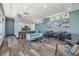 A modern resident lounge area features a kitchenette, seating and tables for a comfortable gathering space at 1120 E Kennedy Blvd # 912, Tampa, FL 33602
