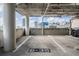 Open-air parking garage with skyline view and clearly marked parking spaces at 1120 E Kennedy Blvd # 912, Tampa, FL 33602